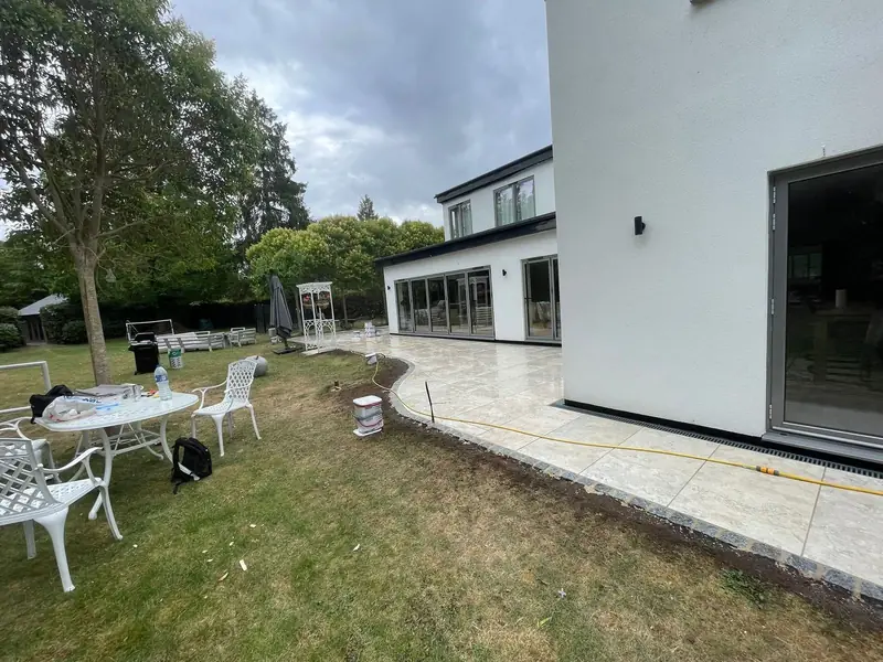 Completed porcelain patio and lawn — SB Constructions Stoke
